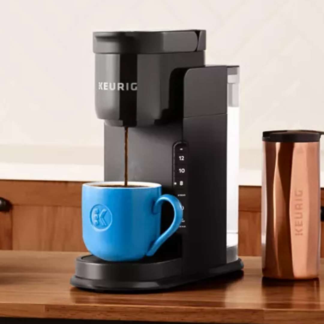 keurig express vs mini - featured image of keurig express dripping coffee into a blue mug